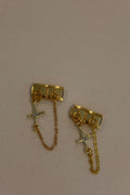 Golden cross charm